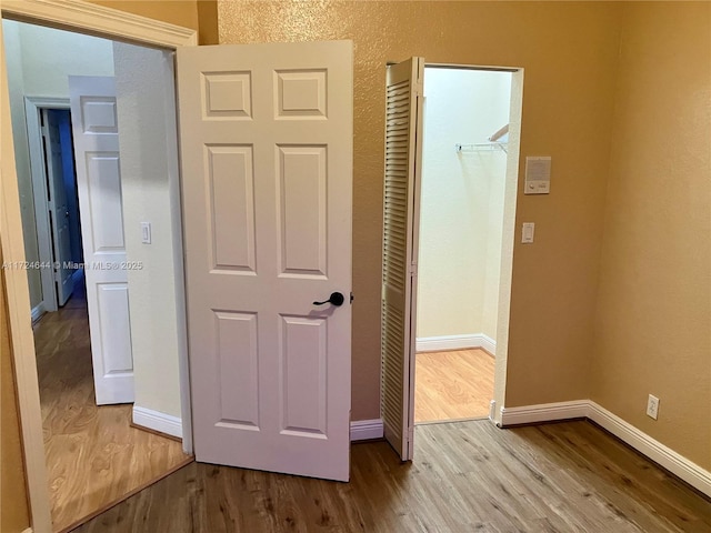 hallway featuring light hardwood / wood-style floors