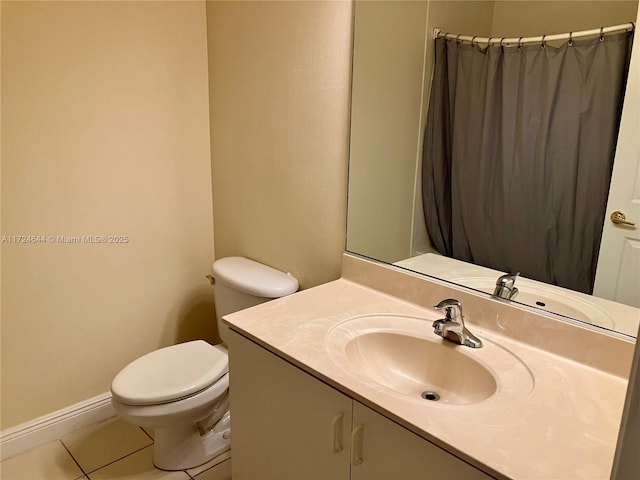 bathroom with a shower with shower curtain, vanity, toilet, and tile patterned flooring