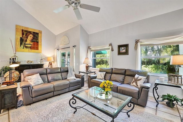 tiled living room with lofted ceiling and ceiling fan