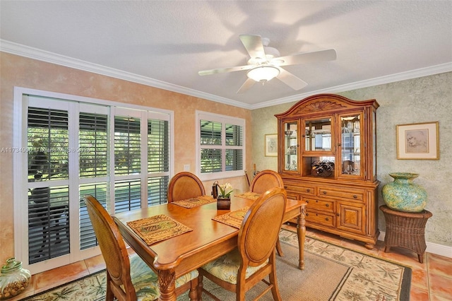 dining space featuring ceiling fan, ornamental molding, and light tile patterned floors