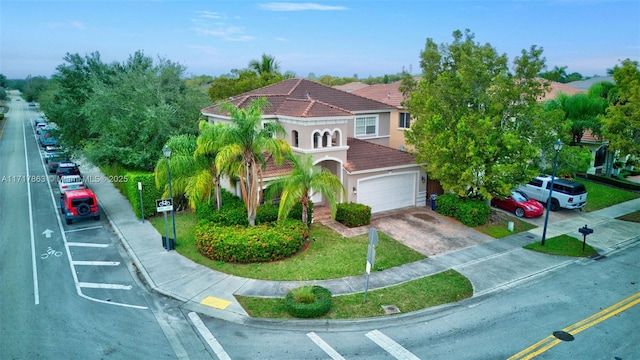 view of front of property with a garage