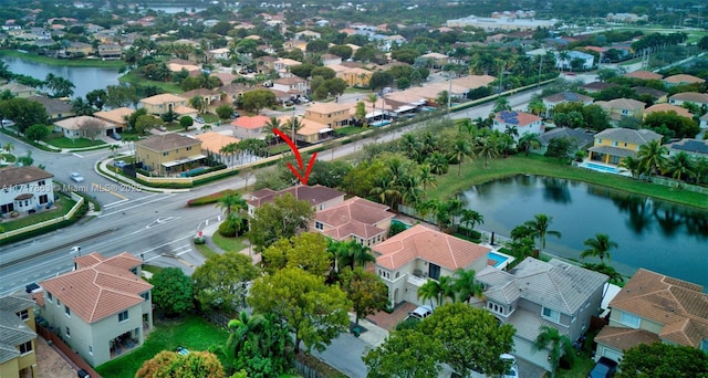 drone / aerial view featuring a water view