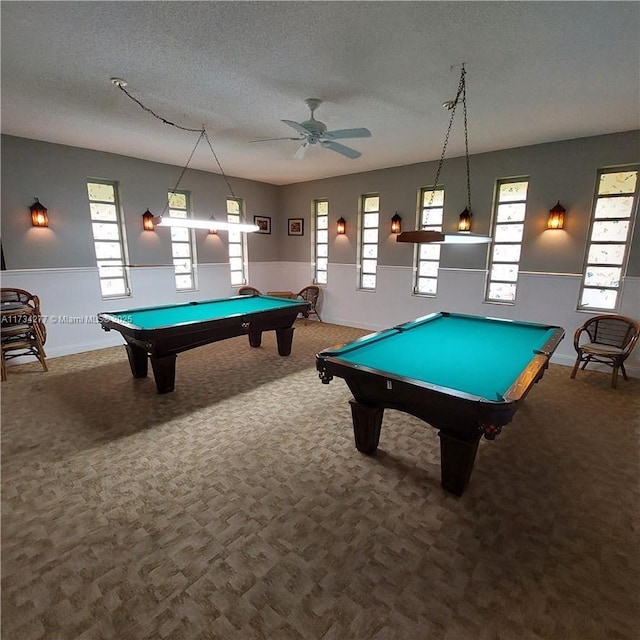 game room with ceiling fan, billiards, carpet floors, and a textured ceiling