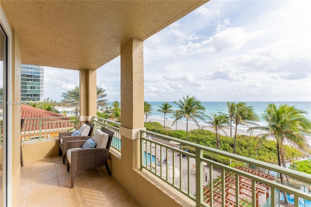 balcony featuring a water view