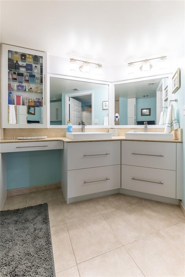 bathroom featuring vanity and tile patterned floors