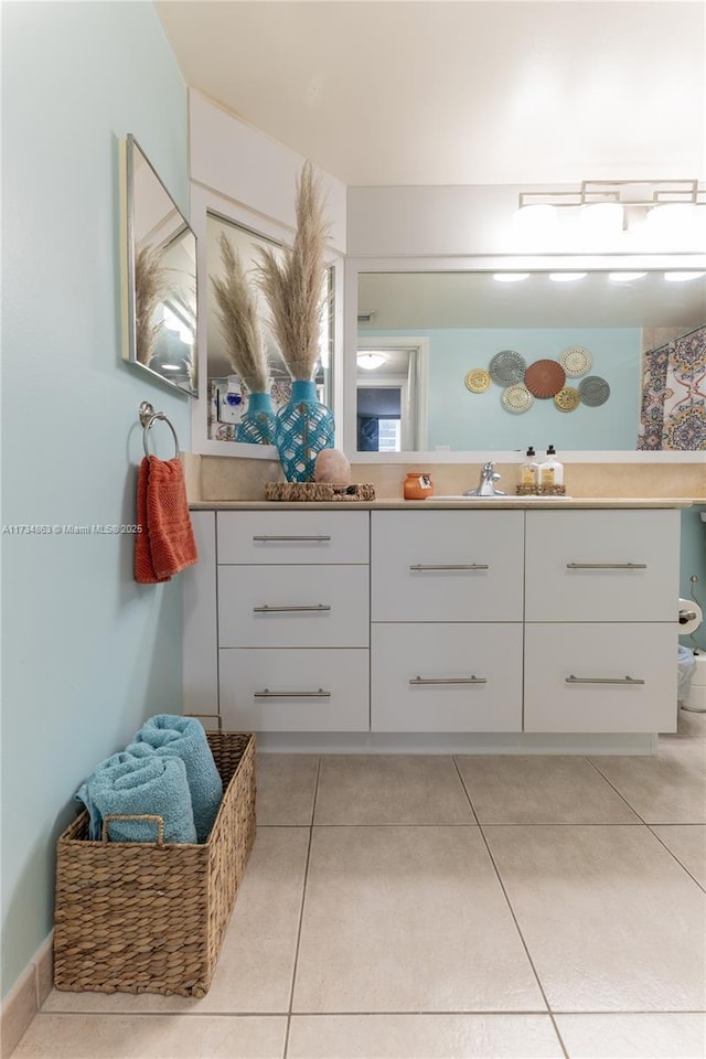 bathroom featuring vanity and tile patterned floors