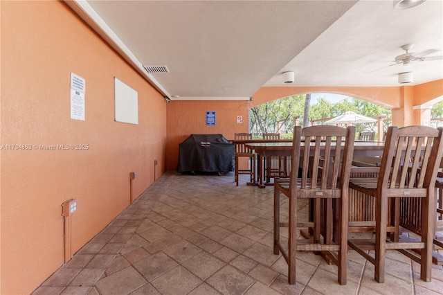 dining room featuring ceiling fan