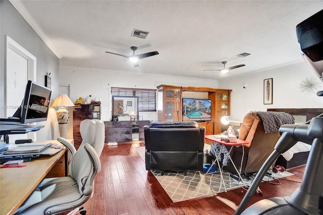 office area with hardwood / wood-style floors, crown molding, a textured ceiling, and ceiling fan