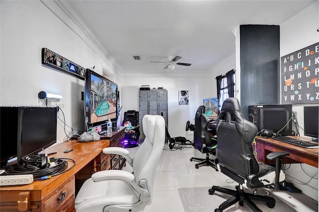 home office with light tile patterned flooring, ceiling fan, and ornamental molding