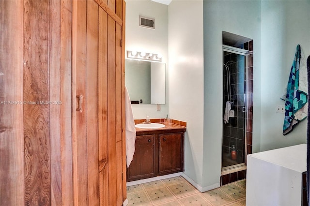 bathroom featuring vanity and walk in shower