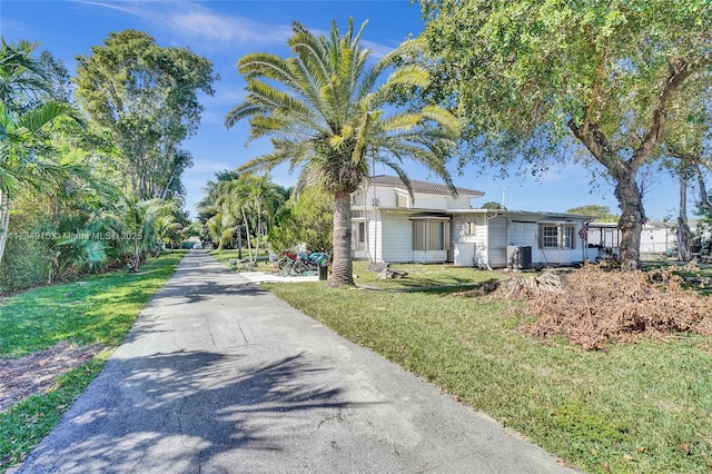 exterior space with a front lawn