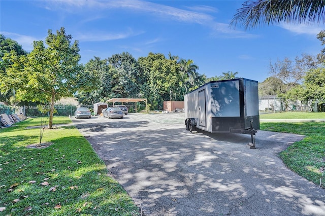 view of property's community featuring a lawn