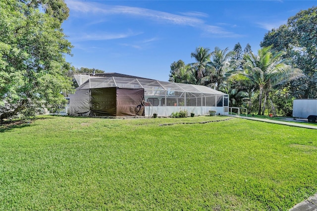 exterior space featuring a lanai and a front lawn