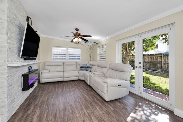 living room featuring ornamental molding, ceiling fan, dark hardwood / wood-style flooring, and french doors