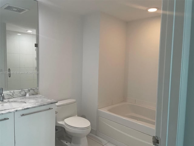 full bathroom with tile patterned floors, vanity, toilet, and shower / tub combination