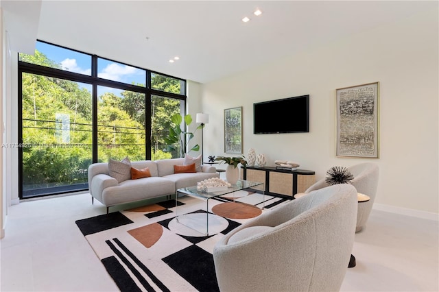 living room with floor to ceiling windows