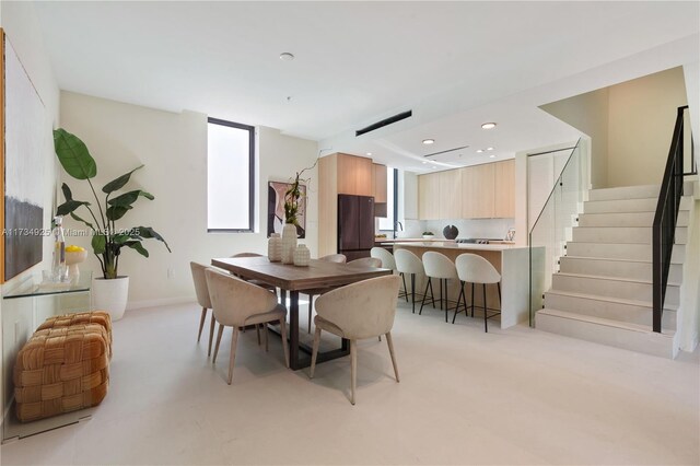 dining room with a wall of windows