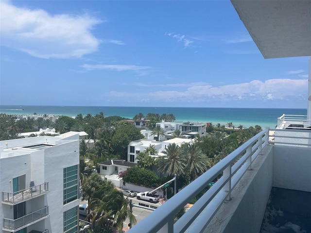 balcony featuring a water view