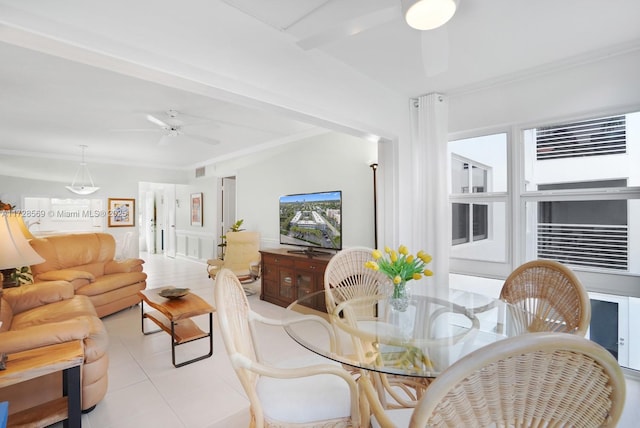 tiled living room featuring crown molding and ceiling fan