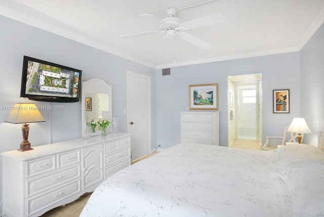 bedroom featuring crown molding, ensuite bath, and ceiling fan