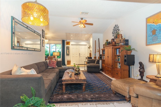 living room with lofted ceiling and ceiling fan