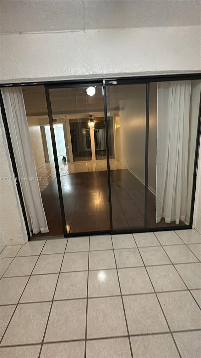 interior space featuring tile patterned flooring