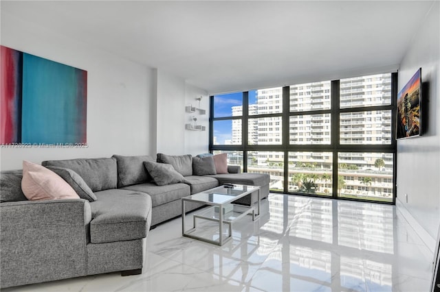 living room with floor to ceiling windows