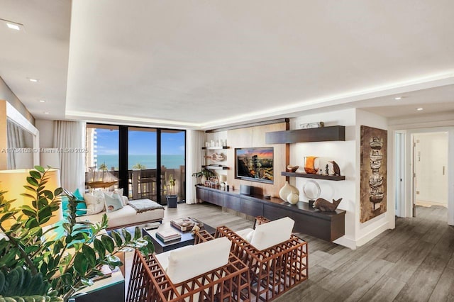 1121 Crandon Blvd Unit D706, Key Biscayne, FL 33149 - living area featuring baseboards, wood finished floors, recessed lighting, and floor to ceiling windows