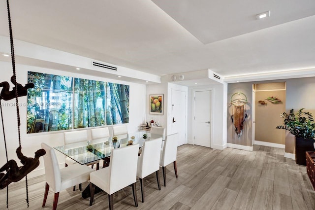 1121 Crandon Blvd Unit D706, Key Biscayne, FL 33149 - dining area with recessed lighting, wood finished floors, visible vents, and baseboards