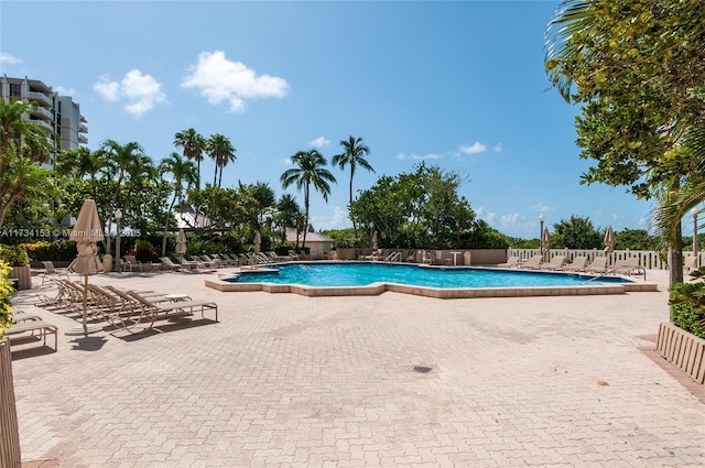 1121 Crandon Blvd Unit D706, Key Biscayne, FL 33149 - pool with fence and a patio