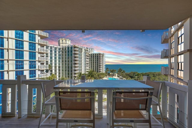 balcony at dusk with a water view