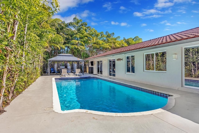 view of pool featuring a gazebo and a patio