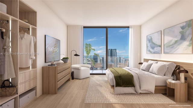 bedroom featuring floor to ceiling windows and light hardwood / wood-style floors