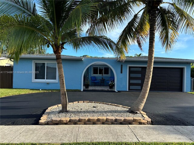 view of front of home with a garage