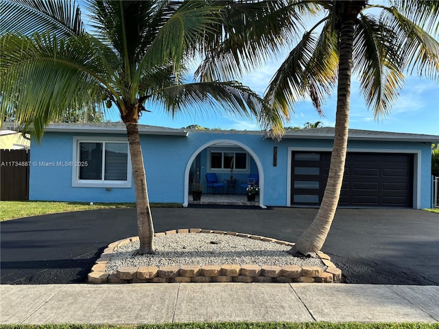 view of front of home with a garage