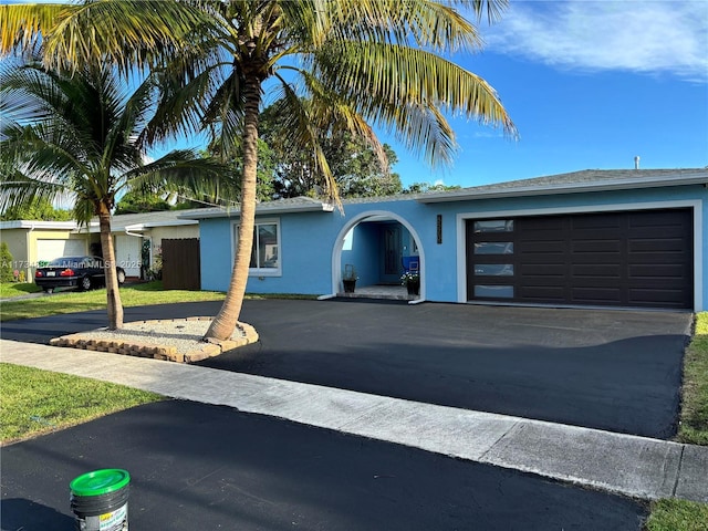 ranch-style house with a garage