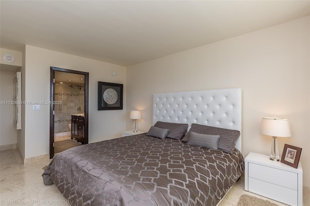 bedroom featuring ensuite bathroom