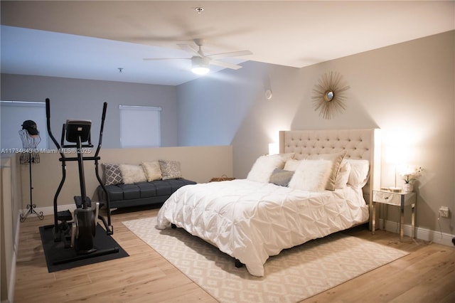 bedroom featuring light hardwood / wood-style floors and ceiling fan