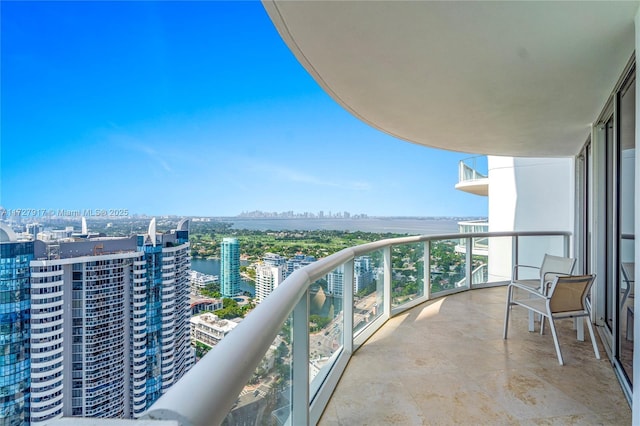 balcony featuring a water view