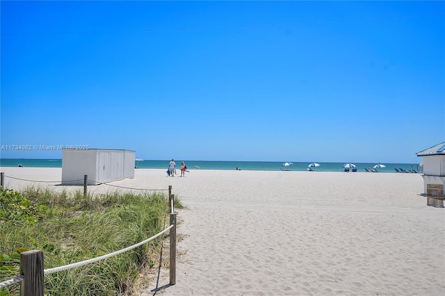 property view of water with a beach view