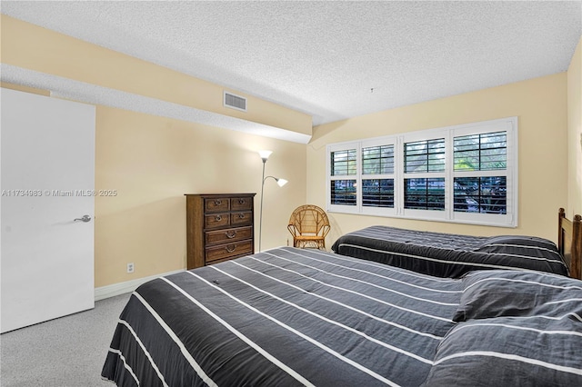 bedroom with a textured ceiling