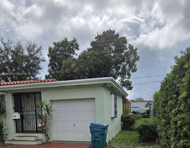 view of home's exterior with a garage