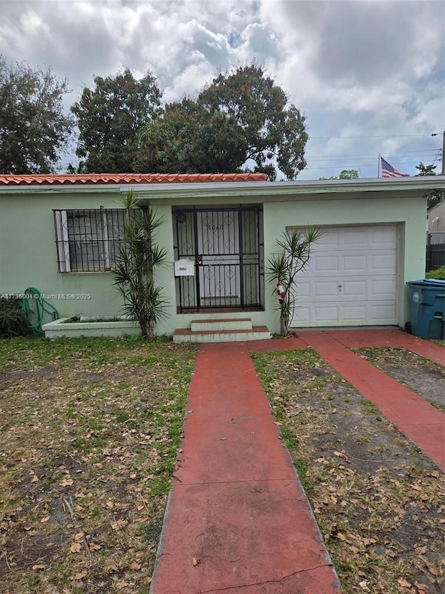 view of front of home with a garage