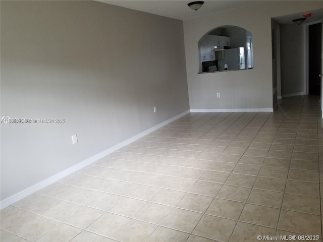 view of tiled empty room