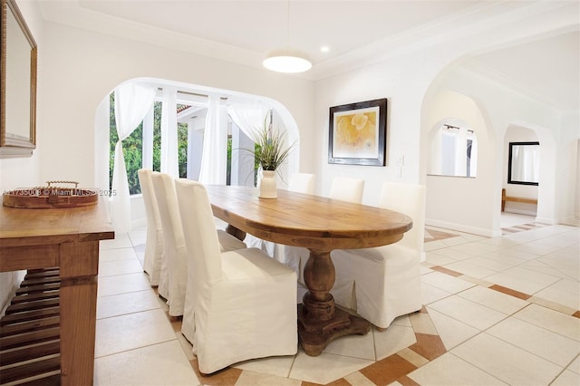 tiled dining space with crown molding