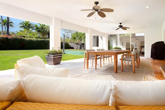 view of patio with an outdoor hangout area and ceiling fan