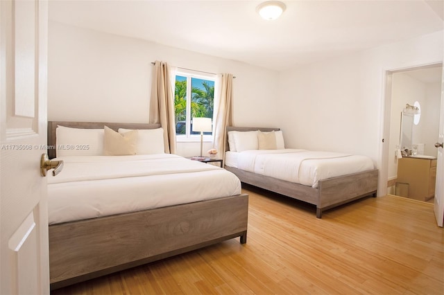 bedroom featuring hardwood / wood-style flooring