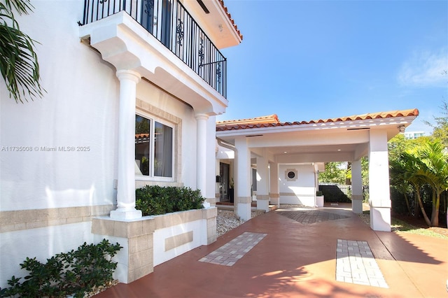 view of patio / terrace with a balcony