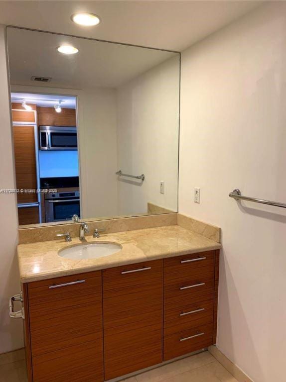 50 Biscayne Blvd Unit 4609, Miami, FL 33132 - bathroom with tile patterned floors and vanity