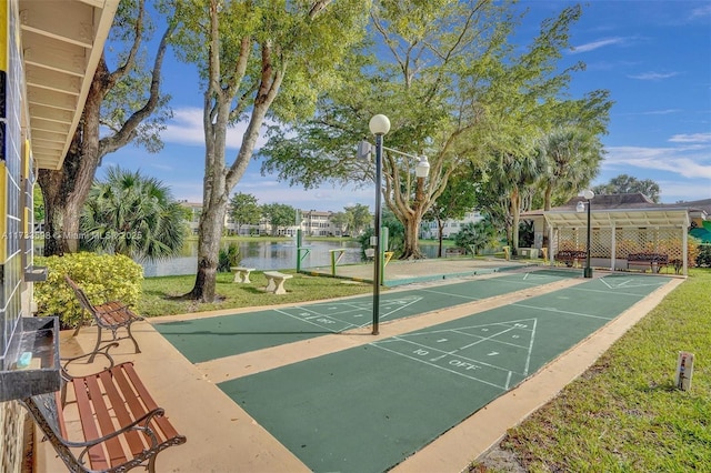 view of property's community featuring a water view